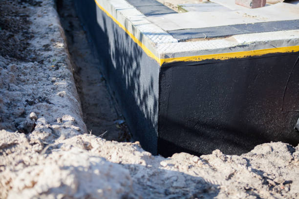 Professional Waterproofing technician working in Demarest, NJ